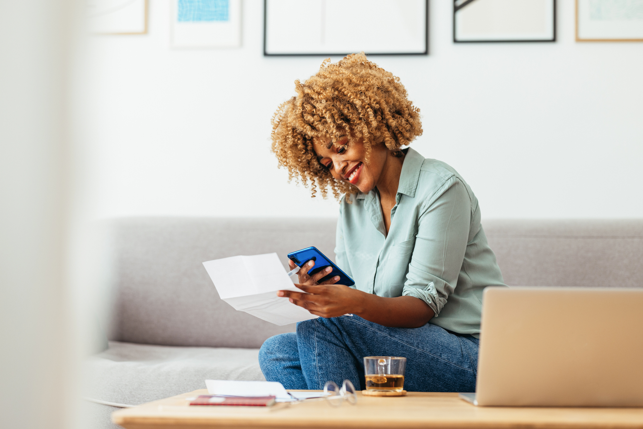 young woman reading bill